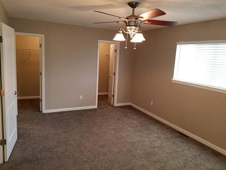 Primary Bedroom with 2 Walk-In Closets