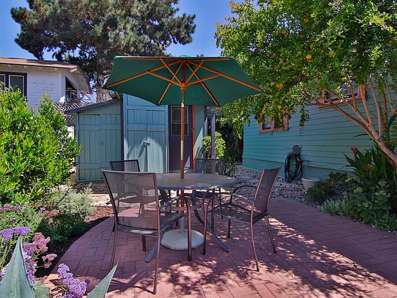 Back yard with view of storage shed