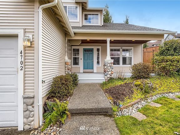 Welcome Home! This freshly painted covered front porch is awaiting your arrival!