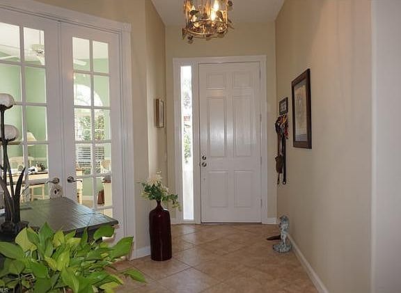 View of front entrance and den