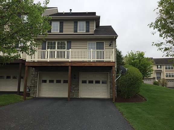 back with 2 car garage and deck