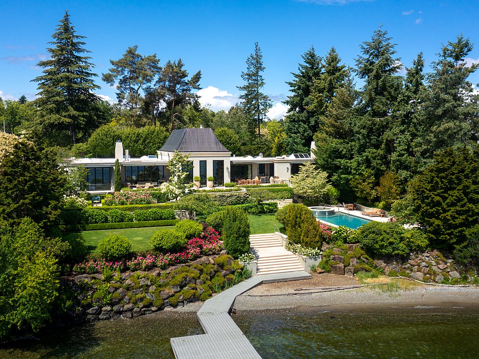 This incredibly rare waterfront estate is one of only four waterfront residences within the nine-home enclave known as The Reed Estate.