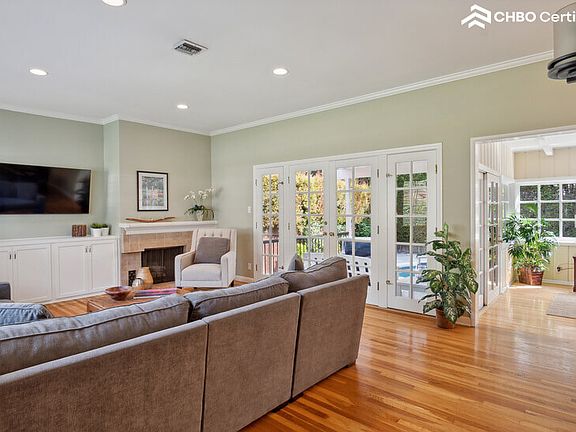 Living room looks out over covered patio