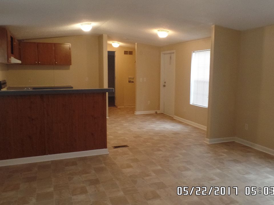 Living room w/ Kitchen view