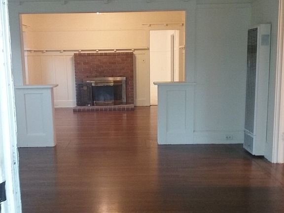 livingroom and dining room w/ fireplace