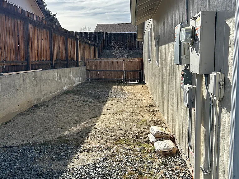 Side extra parking and gate to back yard