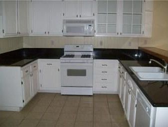 Remodeled kitchen with granite counters