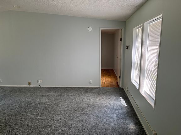 View of door to master bedroom from front door.