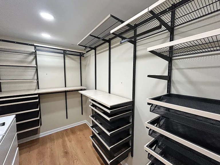 Huge master closet with new, Container Store brand, closet organizational system to maximize closet space!