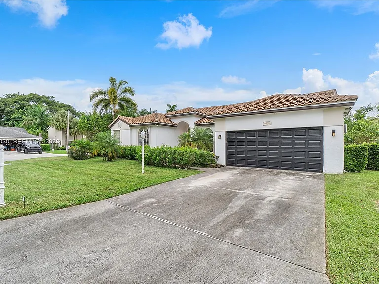 9251 NW 42nd Ct — Photo 45