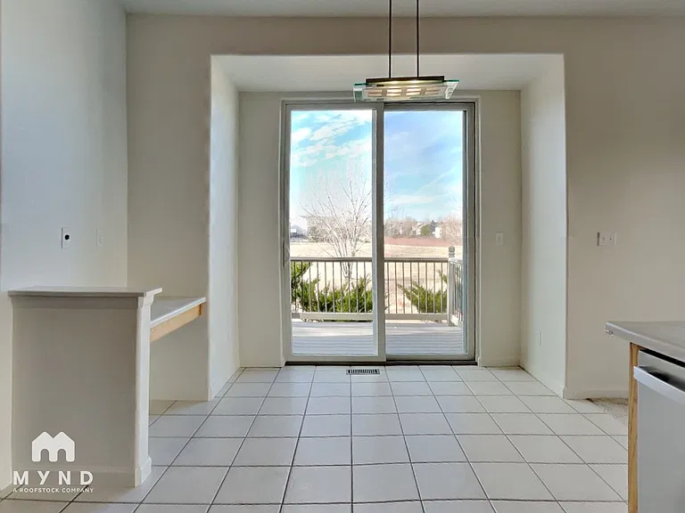 5965 S Waco St — Photo 6