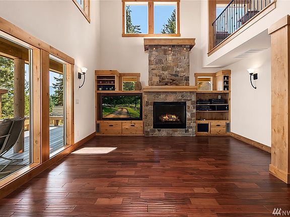 Large windows frame the views from the great room.