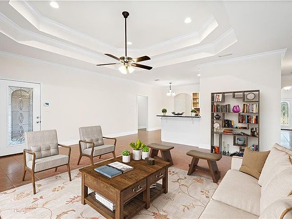 Sitting room, foyer/ entrance and formal dining room