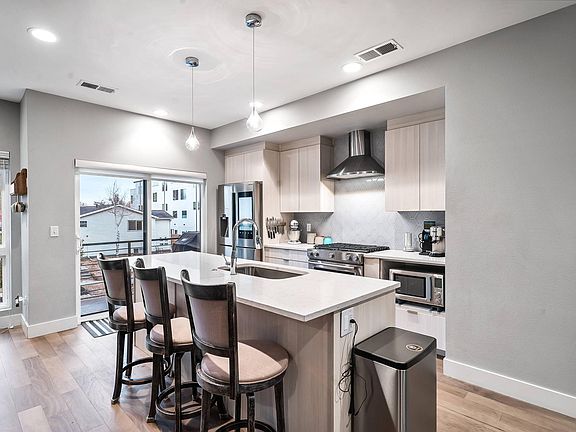This kitchen is perfect for hosting. With a set-in gas line on the patio by the kitchen, it makes it easy to set up a grill and use it to prepare your meals.
