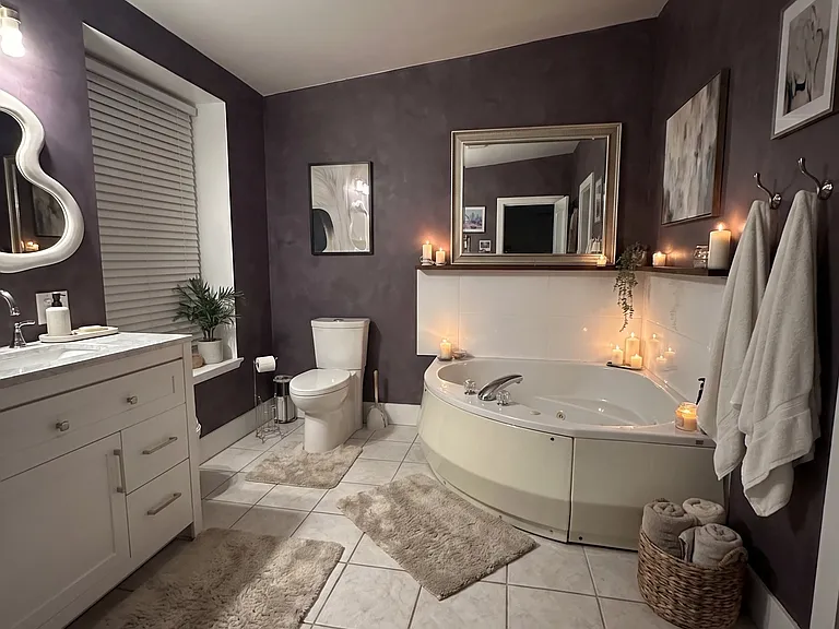BATHROOM ALSO HAS A STAND UP SHOWER TO THE RIGHT YOU CANNOT SEE IN IMAGE