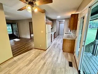 View from dining area of kitchen and living room.