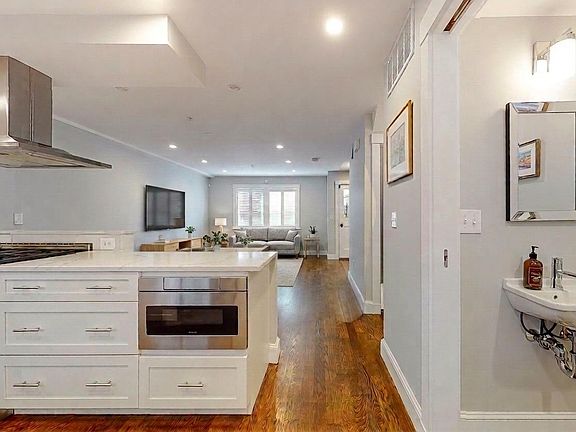 Kitchen and open living area, 1st floor (staged)