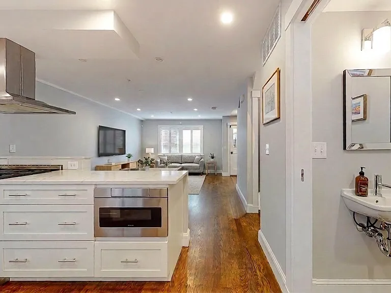 Kitchen and open living area, 1st floor (staged)