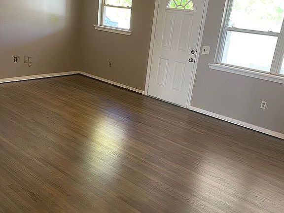 one of 2 living rooms