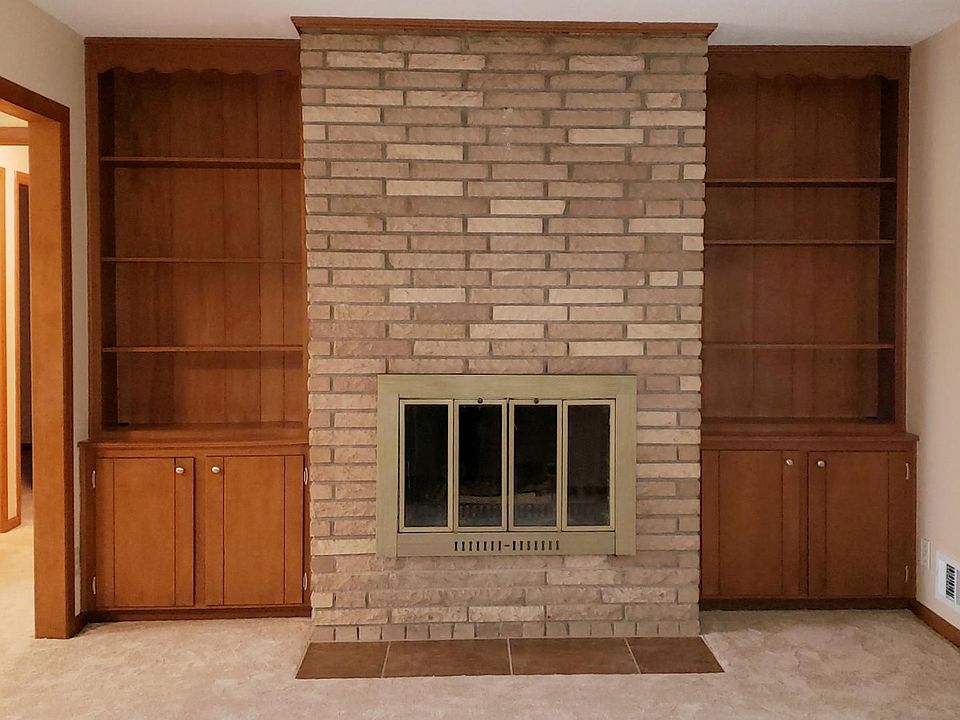 Living Room with Wood Burning Fireplace