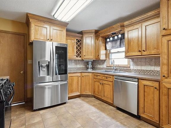 4th image of 12500 E 49th Ter S