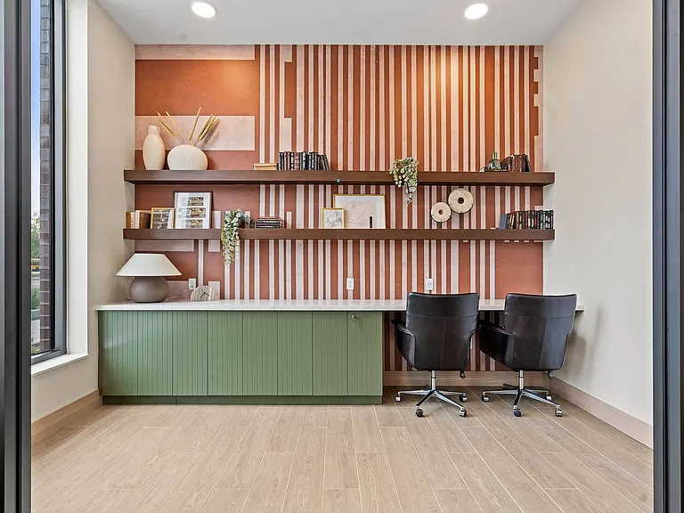 Outside the conference room, dedicated work spaces for remote workers at The Hallon Luxury Apartments in Hopkins MN