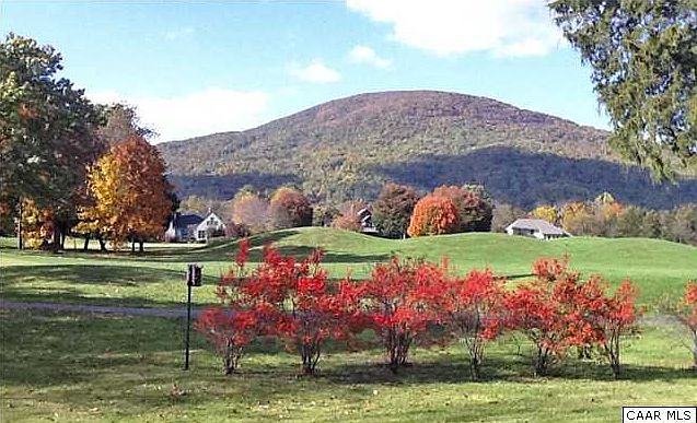 Breathtaking mountain and golf fairway views from this home