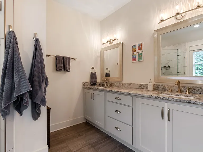 With a large double vanity, space is no concern in the primary en suite bathroom.