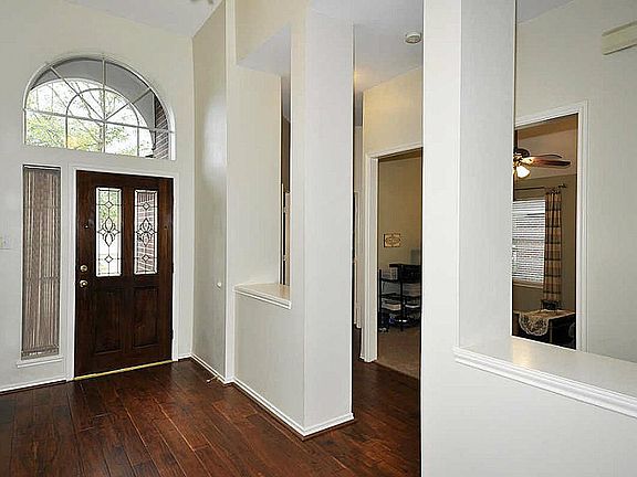 A view from the formal dining; two bedrooms & study.