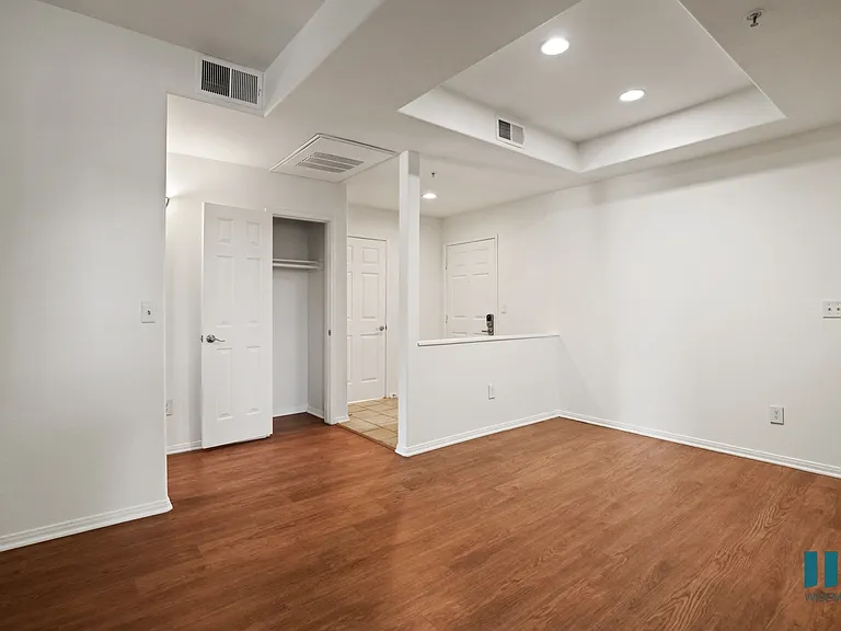 Front Entrance with Hall Closet, Vinyl Flooring, and Recessed Lighting