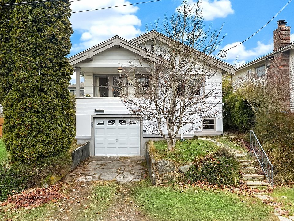 This cute house, built in 1925, is on a large lot.  Single car garage is part of the full basement.  N 100th is a designated "Stay Safe" street in the City of Seattle.>