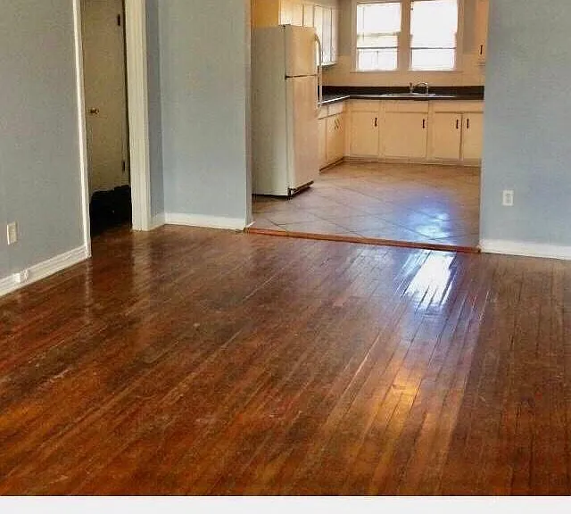 Lots of character. Archway from living room to kitchen