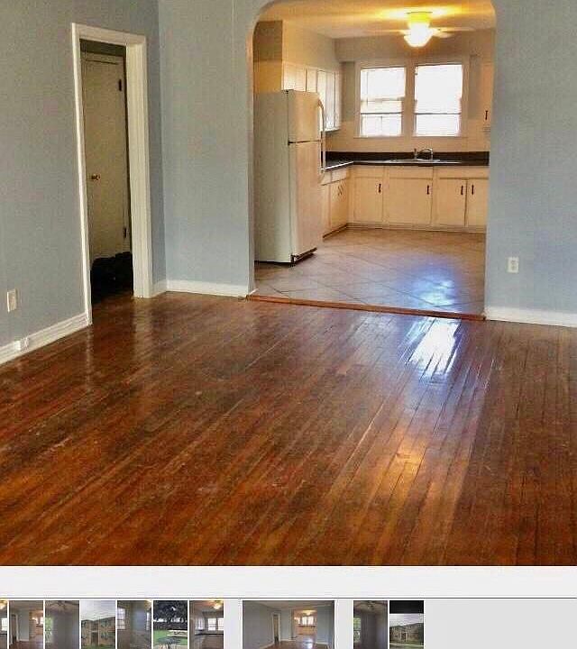 Lots of character. Archway from living room to kitchen