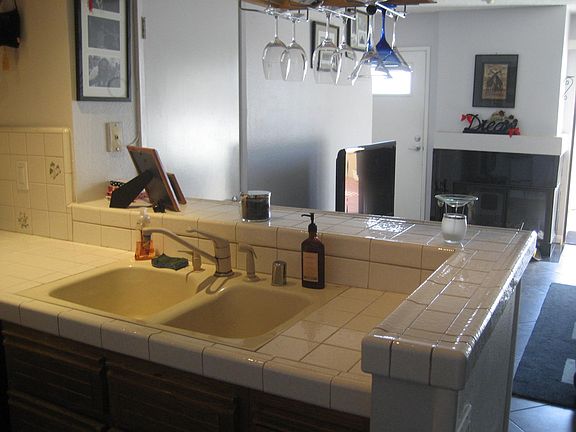 Kitchen opens to living room