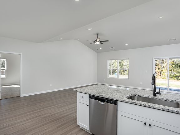 Vinyl flooring throughout.