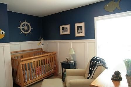 4th bedroom with tasteful molding and contemporary colors