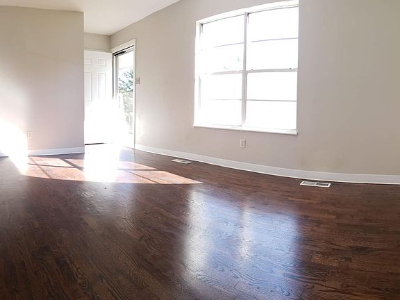 Living Room with Brand New Hardwood Floors and fresh paint o