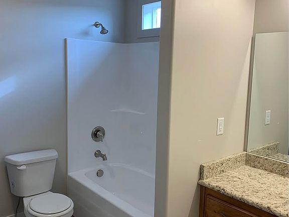 Roomy bathroom with W/D hookups