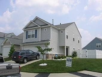 front view of beautiful corner lot home