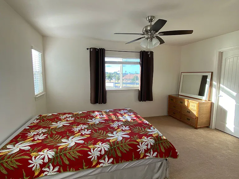 Master bedroom + door to walk in closet
