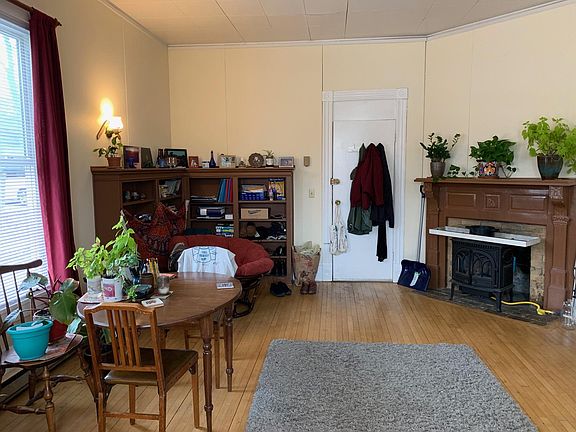 Facing apartment entry & gas fireplace