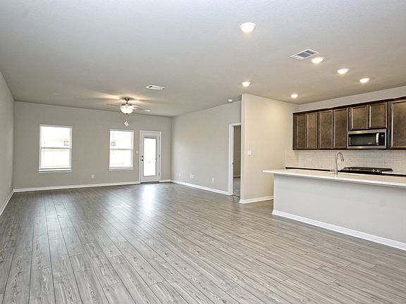 Bring together family and friends with this open-concept floorplan.