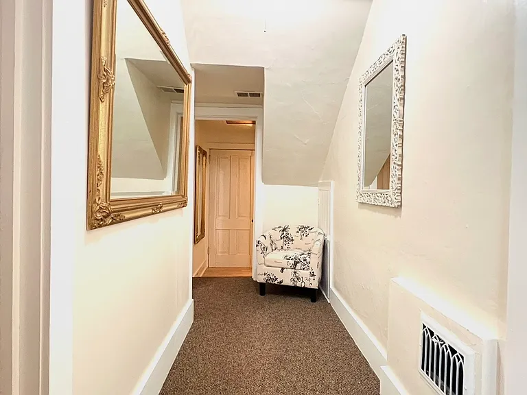 Hallway to your bedroom and storage room.