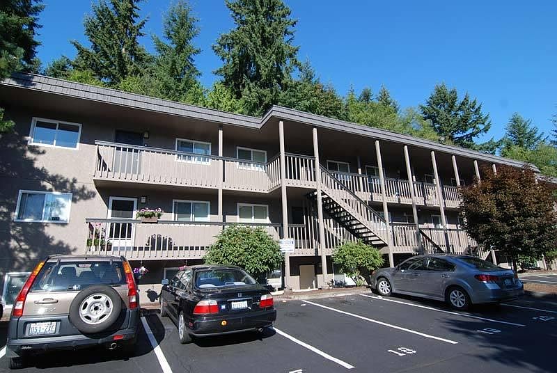 4 walk up buildings in a garden style apartment community with assigned, off street parking included
