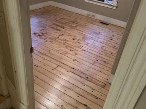 Newly refinished hardwood floors.