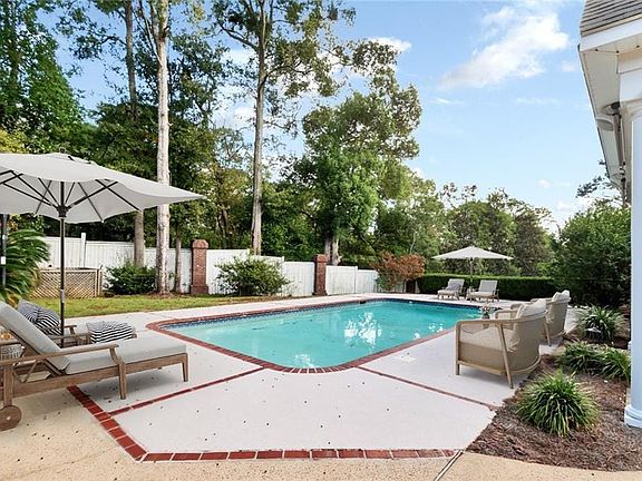 The Red Arrow marks the home in the culdesac neigborhood.  The Yellow Arrow marks a bike/walking path behind the neighborhood. The Homeowners Association keeps the path open so kids can walk to Mary B. Austin School and to St. Paul's School.