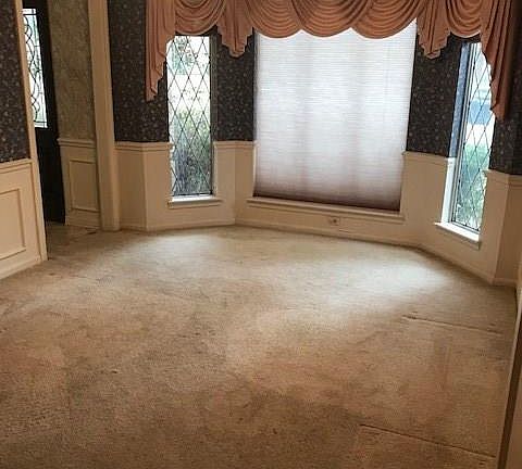 Formal dining room, to the left when you enter the house, but this view is from the kitchen.