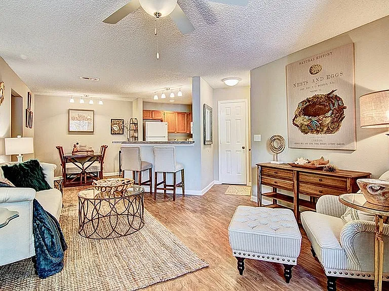 Spacious living room with hardwood-style flooring