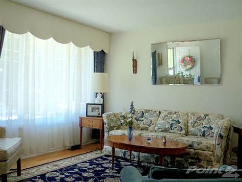 Living Room with refinished hardwoods and fresh paint.