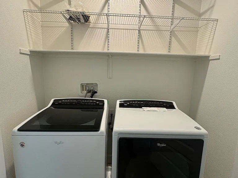 Whirpool Washer and Dryer with shelf on top
